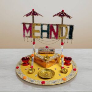 Decorative Mehndi Rasam Thaal with "MEHNDI" centerpiece, umbrella accents & diya holders for wedding, haldi & bridal ceremonies | by Lawat Co.
