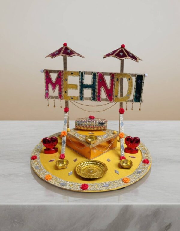 Decorative Mehndi Rasam Thaal with "MEHNDI" centerpiece, umbrella accents & diya holders for wedding, haldi & bridal ceremonies | by Lawat Co.