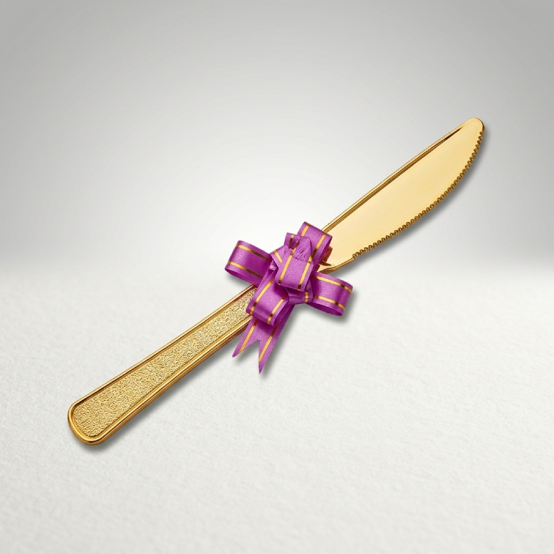 Gold Plastic Cake Knife with Purple Ribbon Bow